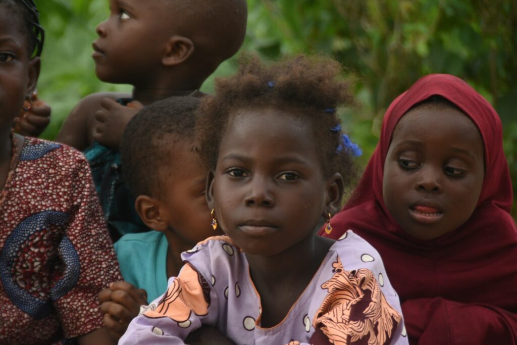 A group of young children looking forward